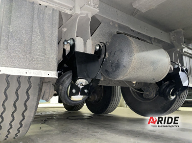 Рис. 9 Наши проекты: Установка механизмов подъема оси для Деловых Линий